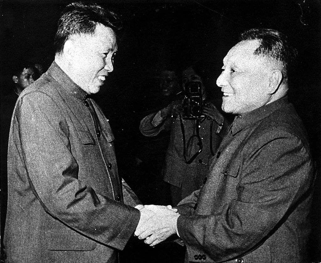 Pol Pot (left), Prime Minister of Cambodia and leader of the Khmer Rouge, shaking hands with Chinese Communist leader Deng Xiaoping at Phnom Penh, 1978.