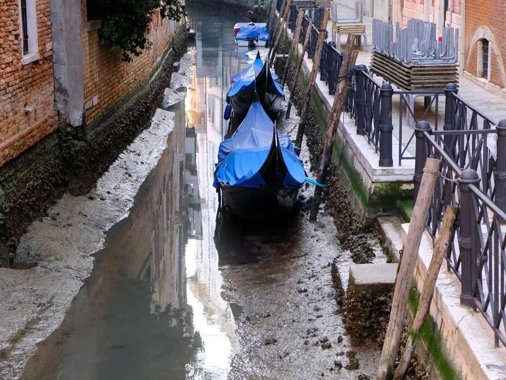 Every year, Venice's canals are partially drained for "mudflat"  maintenance